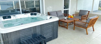 sea view penthouse with 3 floors and an hot tub! can host up to 15 people .