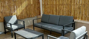 sea view penthouse with 3 floors and an hot tub! can host up to 15 people .
