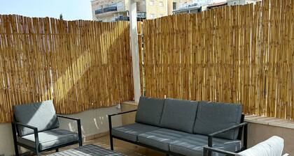 sea view penthouse with 3 floors and an hot tub! can host up to 15 people .