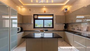 Fridge, microwave, stovetop, cookware/dishes/utensils