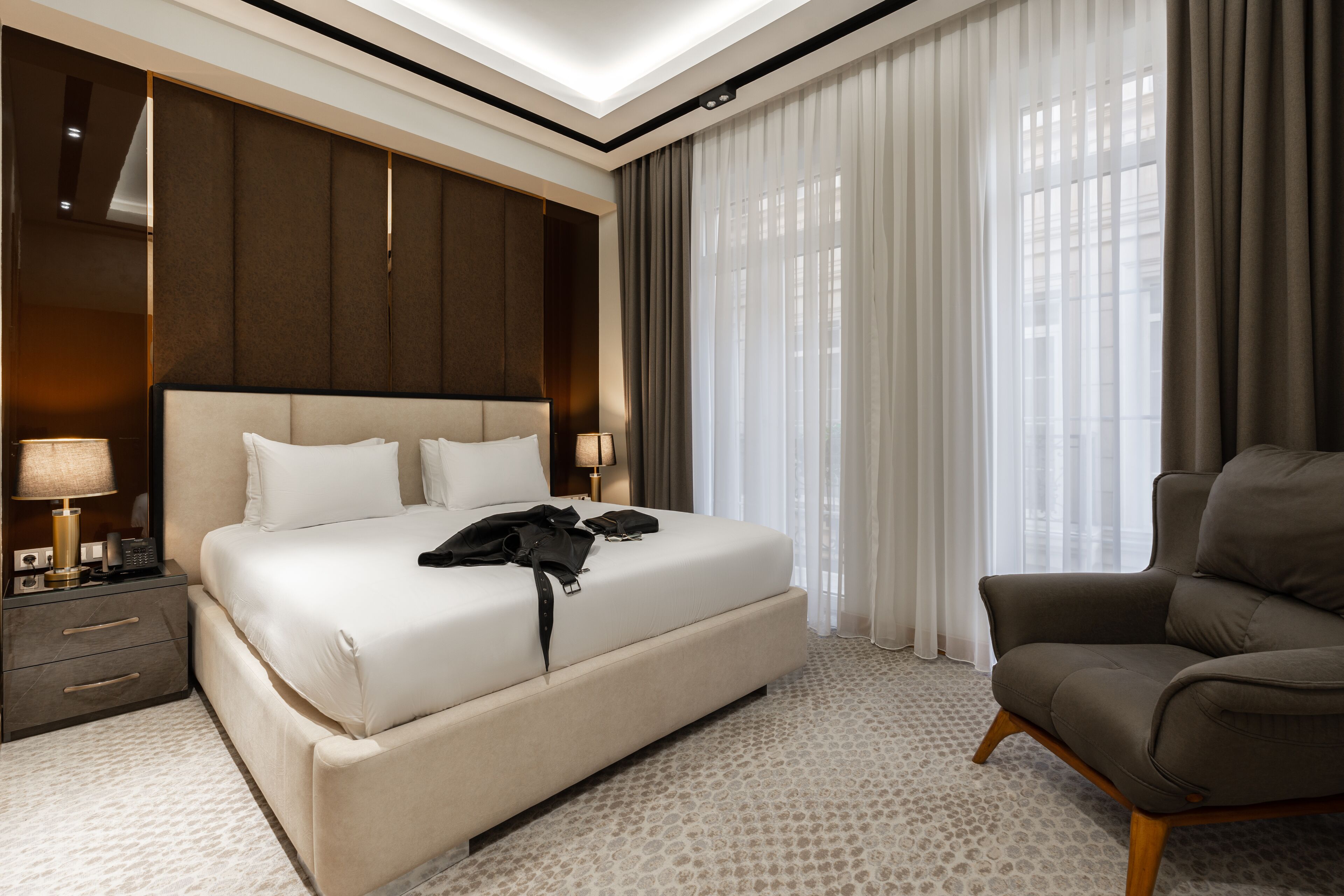 Premium bedding, down duvets, memory-foam beds, minibar