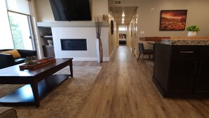 A modern kitchen with a wooden countertop, a built-in oven, and a large window. - SageCreek E7 "BalancedRock Retreat" - Amazing Pool (Moab)
