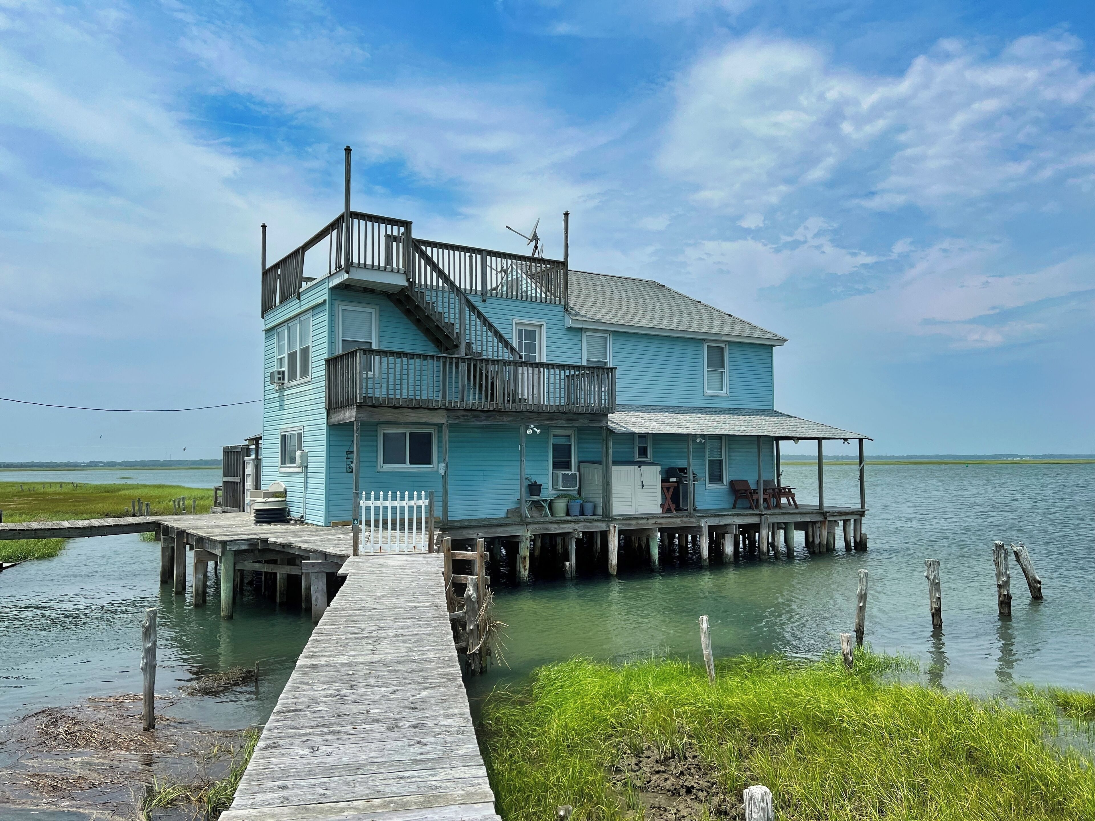 Gorgeous recently renovated home one the bay with a deep water slip!