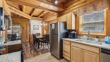 Cabin, 2 Bedrooms | Private kitchen | Fridge, oven, coffee/tea maker, toaster