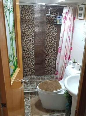 Bidet, towels, soap, shampoo