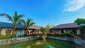 Deluxe Triple Room, Garden View | Terrace/patio