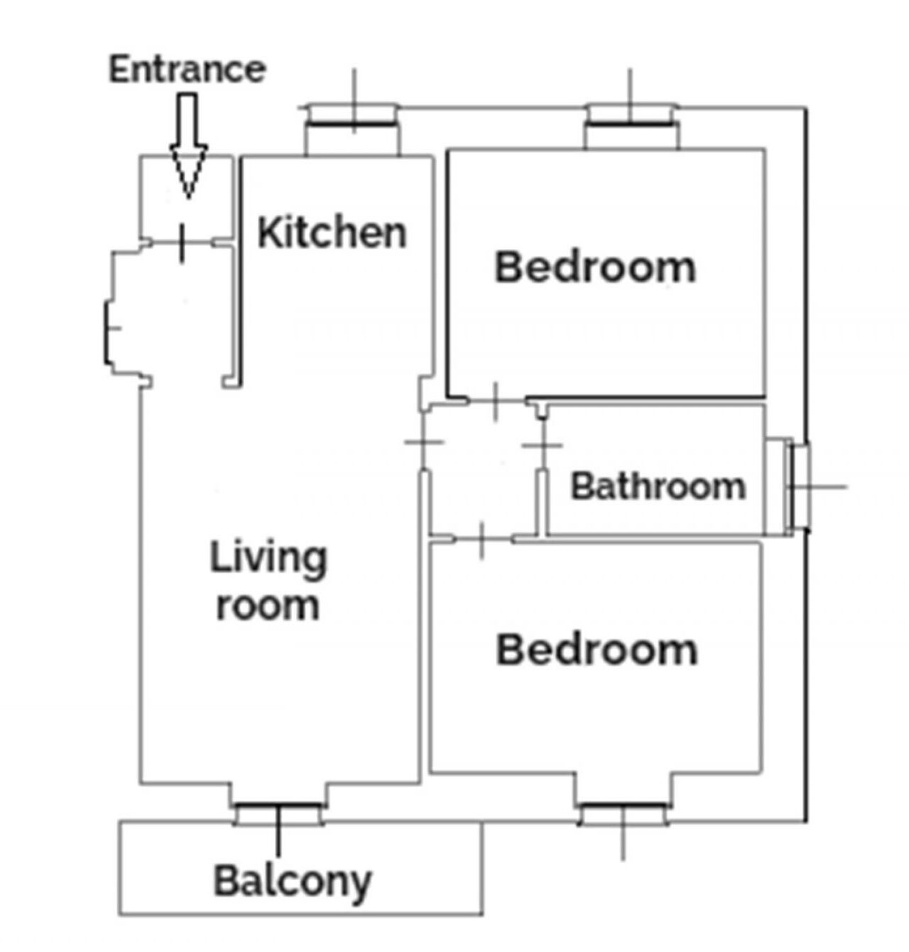 Plano de planta que muestra una entrada que conduce a una cocina, dos dormitorios, un baño y un balcón.