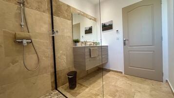 Shower, free toiletries, hair dryer, towels