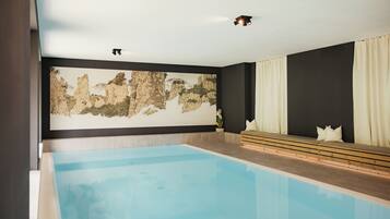 Indoor pool, open 7:00 AM to 7:00 PM, sun loungers