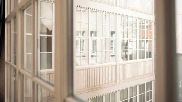 A window with multiple panes and a decorative trim. - ★ Ko-Living IX at the Opera | Right in the center | Free WiFi | Up to 4 people ★ (Halle (Saale))