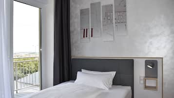 Standard Single Room | In-room safe, individually decorated, desk, laptop workspace