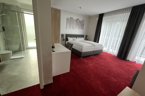 Superior Room | In-room safe, individually decorated, desk, laptop workspace