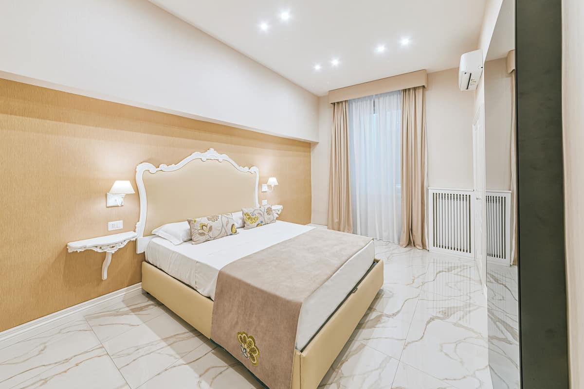 Deluxe Quadruple Room | Premium bedding, pillowtop beds, minibar, in-room safe