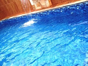 Indoor pool - Cozy House, With Large Pool and Waterfall  (Balneario Verde Mar Mongaguá)