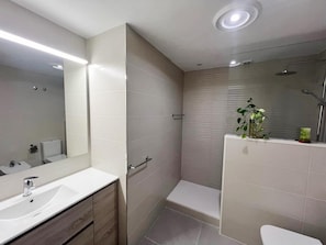 Bathtub, hair dryer, towels