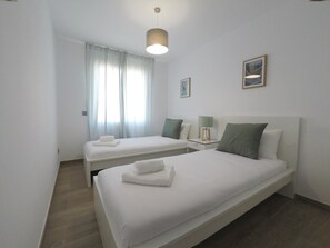 2 habitaciones, tabla de planchar con plancha y internet 