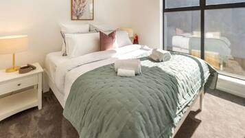 2 dormitorios, tabla de planchar con plancha, wifi gratis y ropa de cama