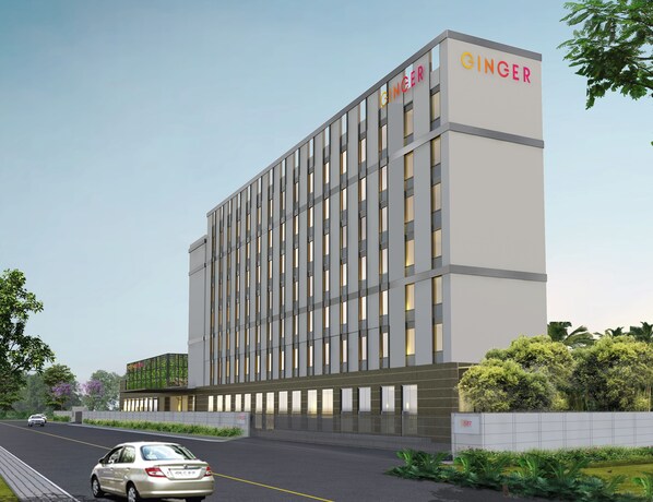 Un edificio moderno con un letrero que dice "GINGER" en la parte superior.