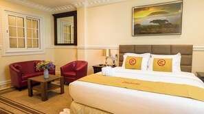 Premium bedding, desk, laptop workspace, soundproofing