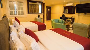 Premium bedding, desk, laptop workspace, soundproofing