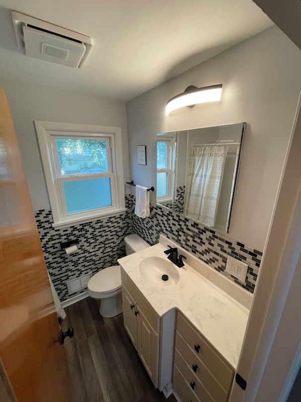 Hair dryer, towels, soap, toilet paper