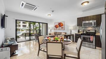 Apartment, 1 King Bed with Sofa bed, Pool View | Living area