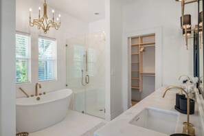 Shower, jetted tub, hair dryer, towels