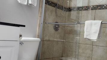 Shower, hair dryer, towels, soap