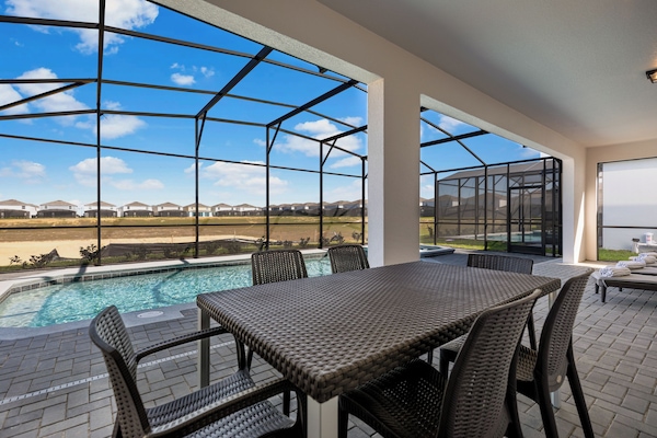 Outdoor pool, a heated pool, pool umbrellas, sun loungers