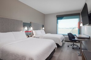 Escritorio, sistema de insonorización y tabla de planchar con plancha 