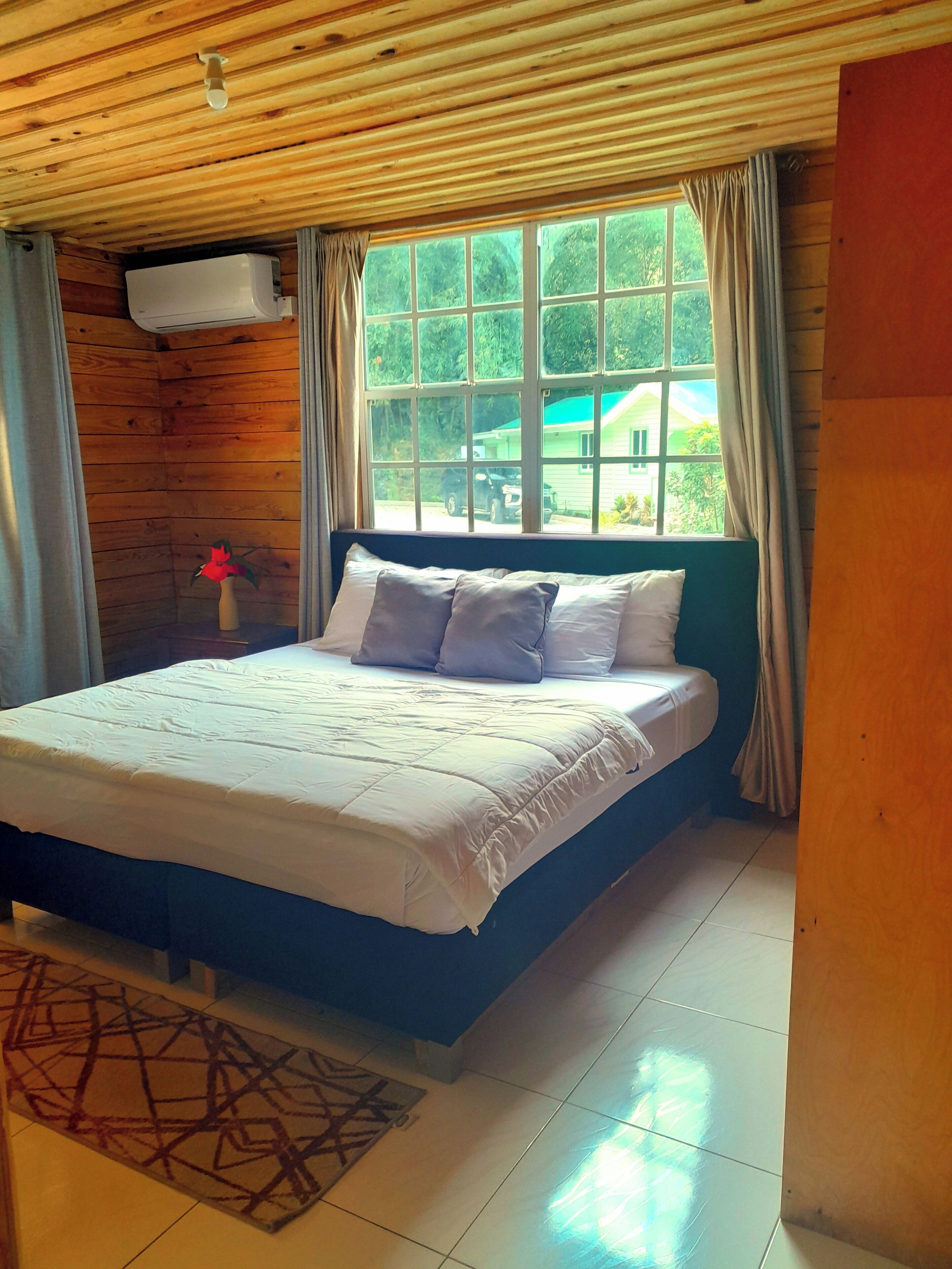 Basic-Ferienhaus, 1 King-Bett, Gartenblick | 1 Schlafzimmer, kostenloses WLAN, Bettwäsche