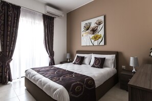 Fer et planche à repasser, Wi-Fi gratuit, draps fournis