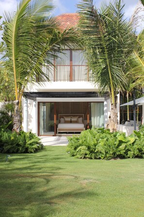 Relax on the spacious balcony with a comfortable seating area, perfect for unwinding or socializing.