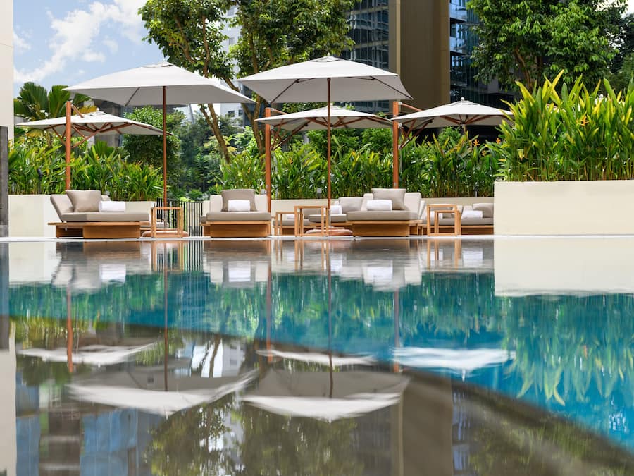 Outdoor pool, open 6:00 AM to 10:00 PM, free pool cabanas