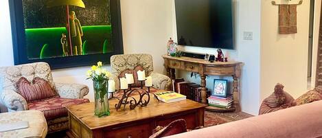 Smart TV, fireplace, books