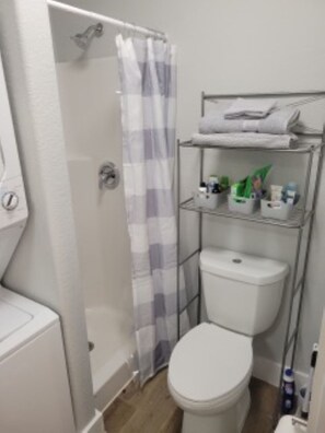 Hair dryer, towels, soap, shampoo
