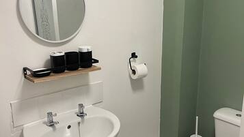 Shower, eco-friendly toiletries, hair dryer, towels