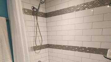 Hair dryer, towels, soap, shampoo