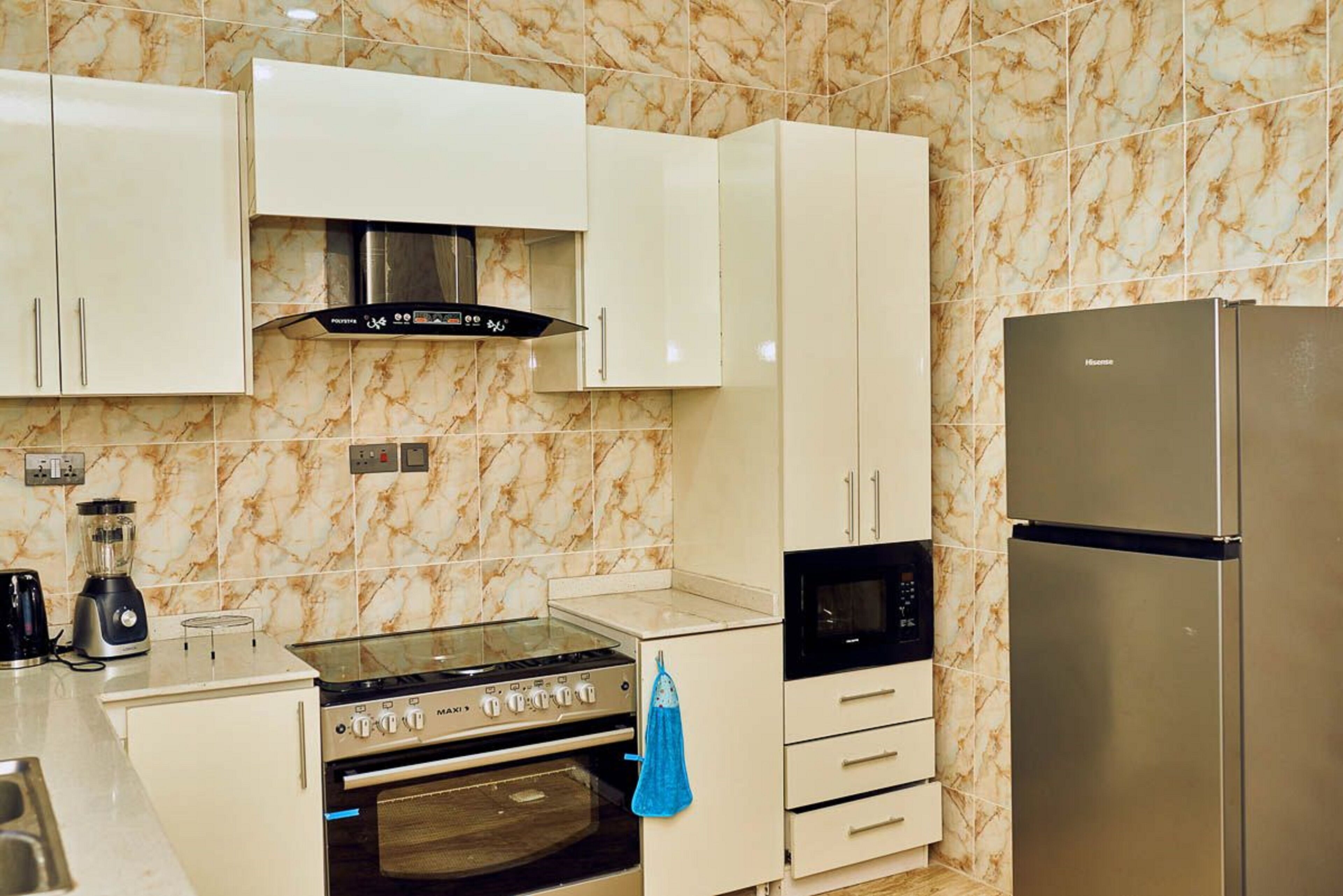 Full-size fridge, microwave, oven, blender