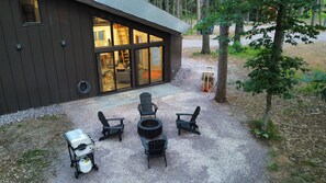 Terrace/patio - Deer Cabin @ Orange Tractor Retreat: a new, 3BR modern cabin on 40 private acres (Wisconsin Dells)