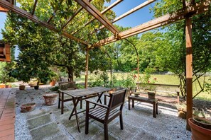 Outdoor dining - Exclusive Duplex Apartment with pool and view (Strognano)