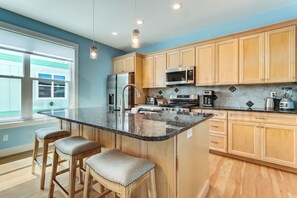 Fridge, microwave, oven, stovetop - Dog Friendly! 7 bedrooms 7 full bathrooms and 2 half baths plus 3 kitchens! Sleeps 21 people! (Fernandina Beach)