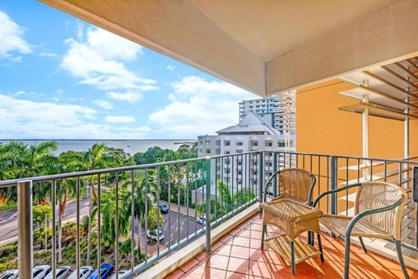 Enjoy your own private, furnished balcony that features a backdrop of Darwin city views and protection against the elements.
