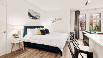 1 bedroom, desk, iron/ironing board, travel cot