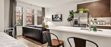 1 bedroom, desk, iron/ironing board, travel cot