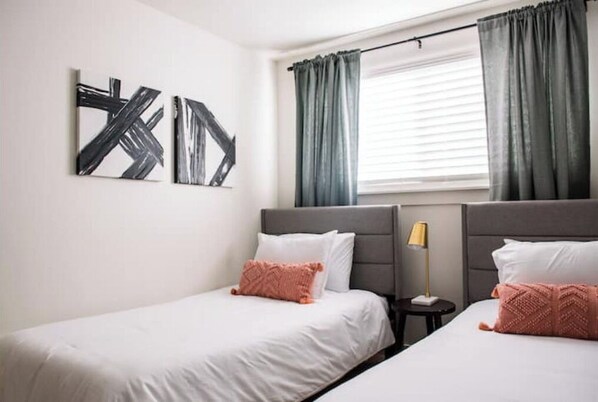 2 bedrooms, desk, iron/ironing board, travel crib