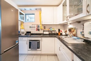 Refrigerador, horno, placa de cocina, lavavajillas