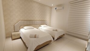 Twin Room | Free WiFi, bed sheets - Kai Hotel (Uribia)