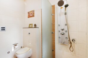 Hair dryer, towels, soap, shampoo