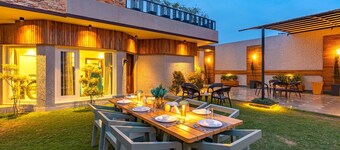 StayVista at D’Amour w/ Lawn & WIFI
